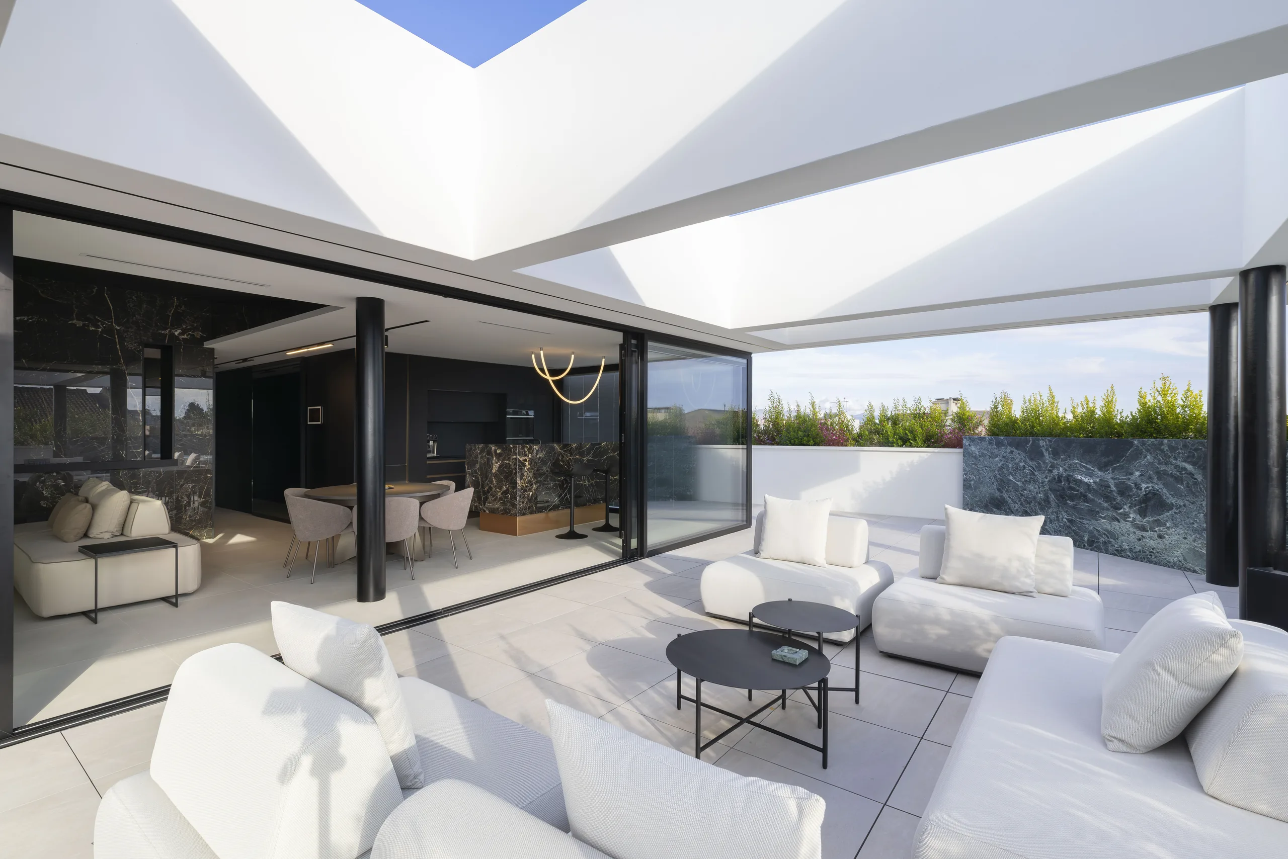 renovated living room in Selargius with bespoke furniture and dark tones
