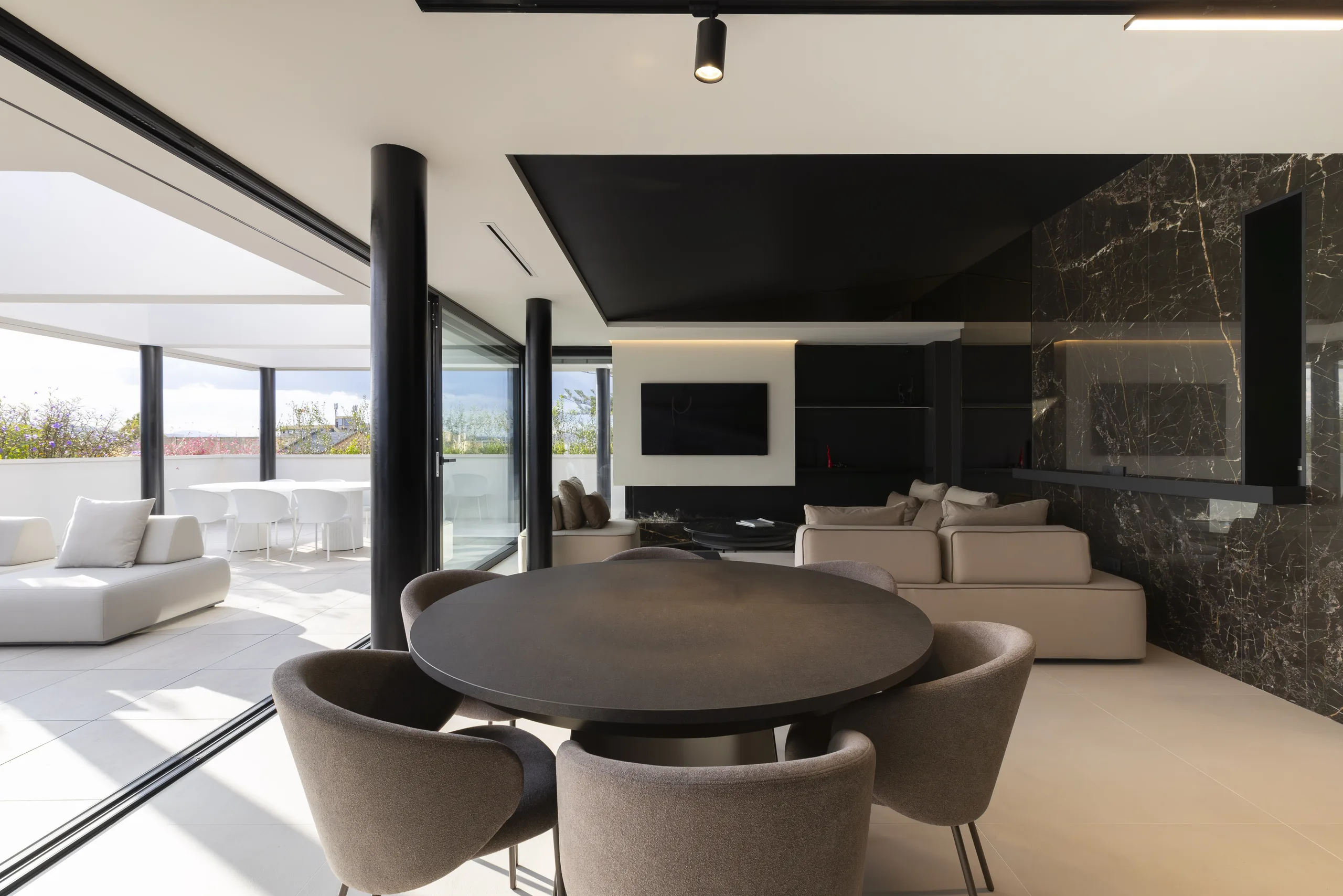 detail of the white pergola on the terrace of a Selargius penthouse